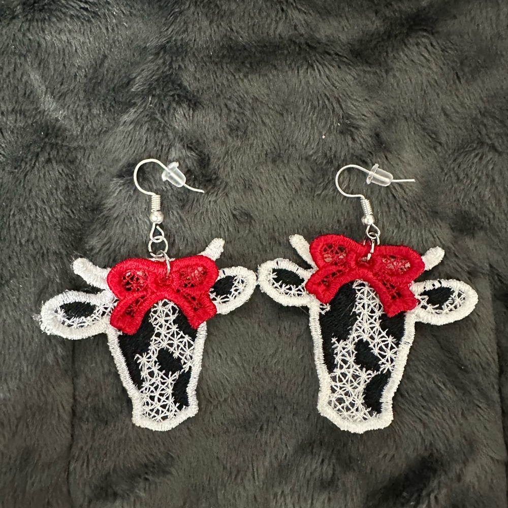 Free Standing Lace Embroidered Cow Pattern Earrings with Red Bow.